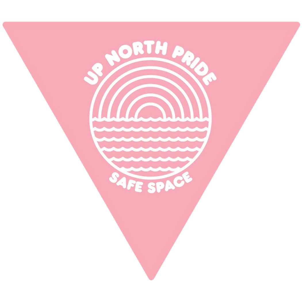 A pink triangular safe space logo for Up North Pride. It features a white emblem showing a stylized rainbow over waves and the words "SAFE SPACE."